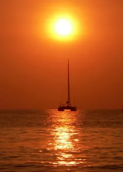 Sunset on a catamaran sailboat