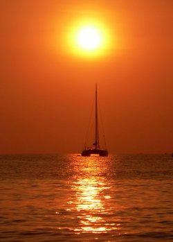 Sunset on a catamaran sailboat
